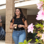 Students Walk By Azaleas After Leaving The Pace Library Coffee House