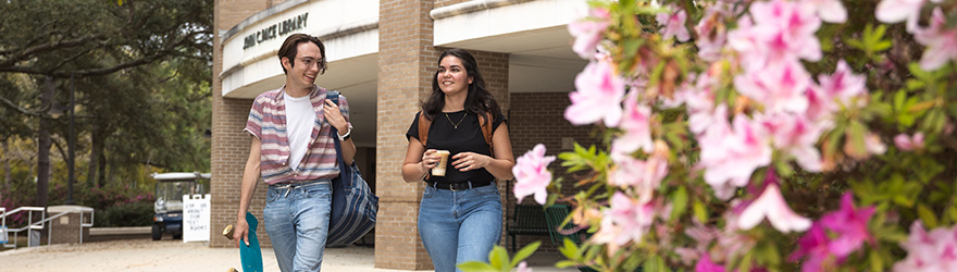 Students Walk By Azaleas After Leaving The Pace Library Coffee House 